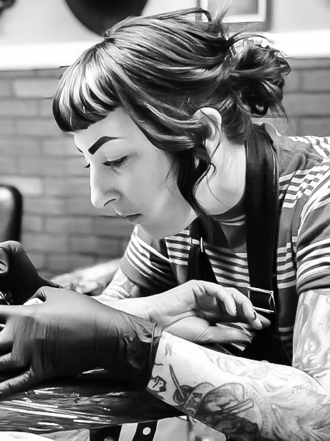 Kelsey Lane tattooing at Heritage