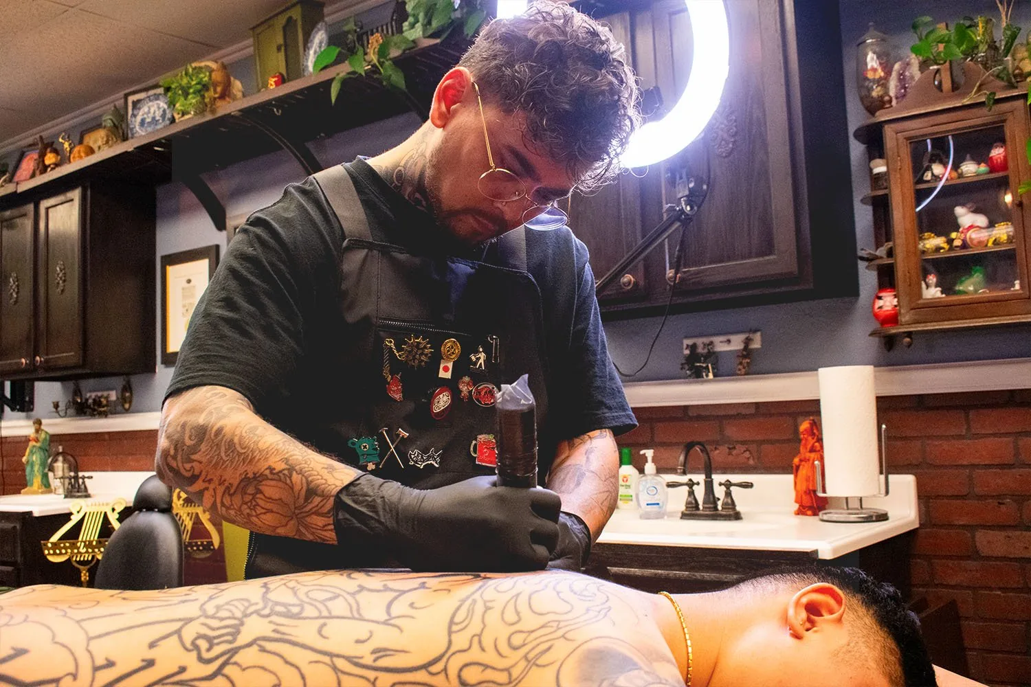 Dylan Prorok tattooing at Heritage
