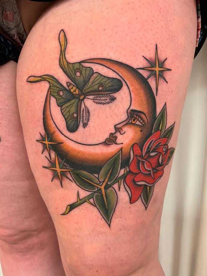 A crescent moon, moth and rose tattoo by Kelsey Lane